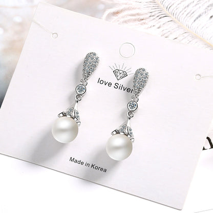 Long pearl earrings