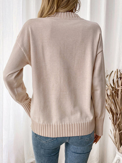 Knitted crew neck sweater with floral details